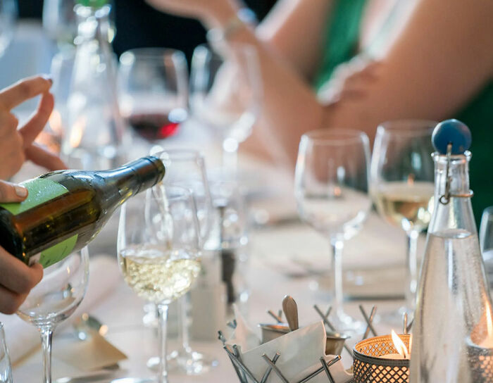 A man pours champagne