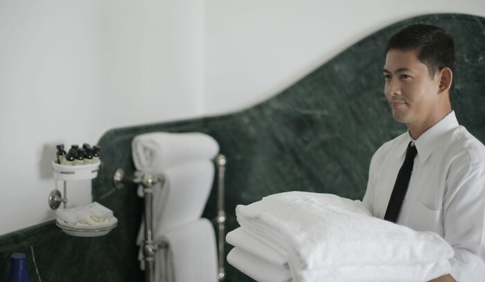 Person holding towels