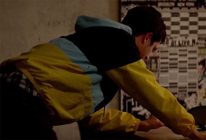 Michael Cera looking at table in movie This is the End