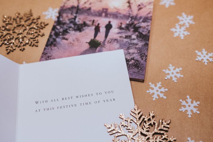 Christmas Holiday Card And Christmas Decorations On The Table 