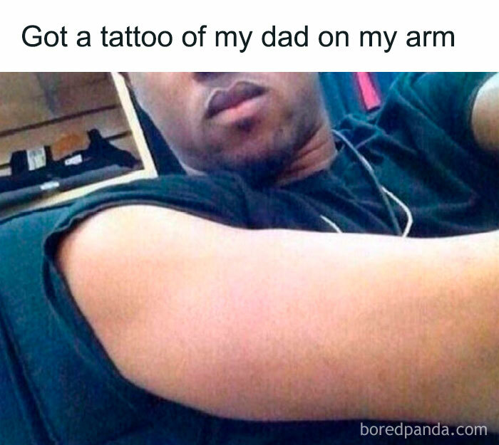 Man displaying his arm with text joke about dad tattoo, highlighting dad jokes humor.