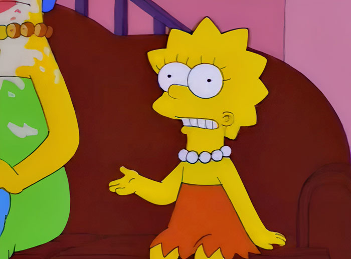 Lisa sitting on the couch 