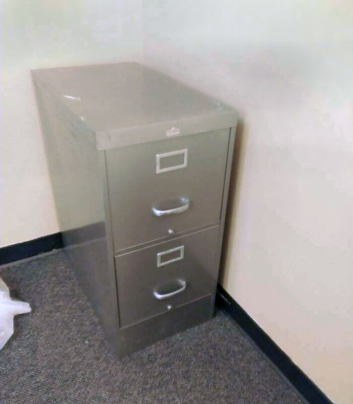 The Shine On This Filing Cabinet Makes It Look Like It's Fading Away