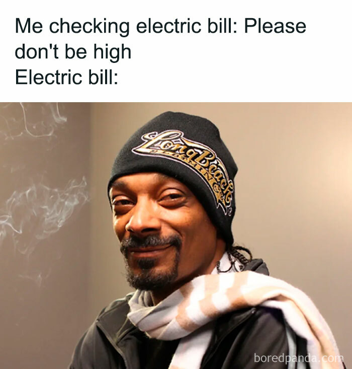 Man in beanie and scarf smirking, illustrating a meme about high electric bills and money.
