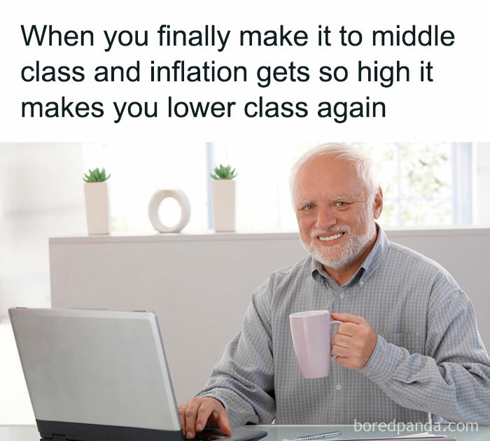 Elderly man at a desk with a laptop, holding a mug, illustrating a funny money meme about inflation and class.