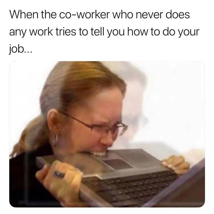 Woman humorously biting a laptop in frustration, relating to the struggle of working in retail.