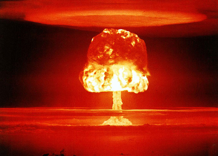 Nuclear explosion with a large mushroom cloud, illustrating a real scientific threat.