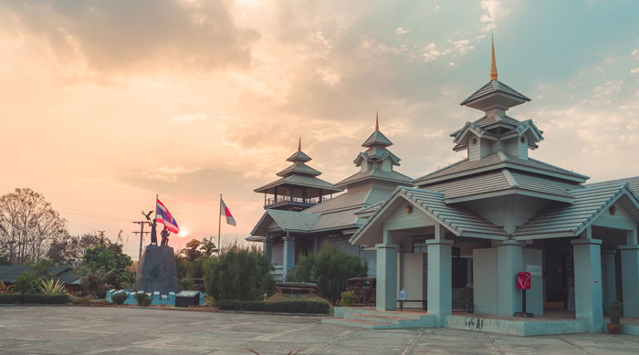 White temple and a sunset in the background 