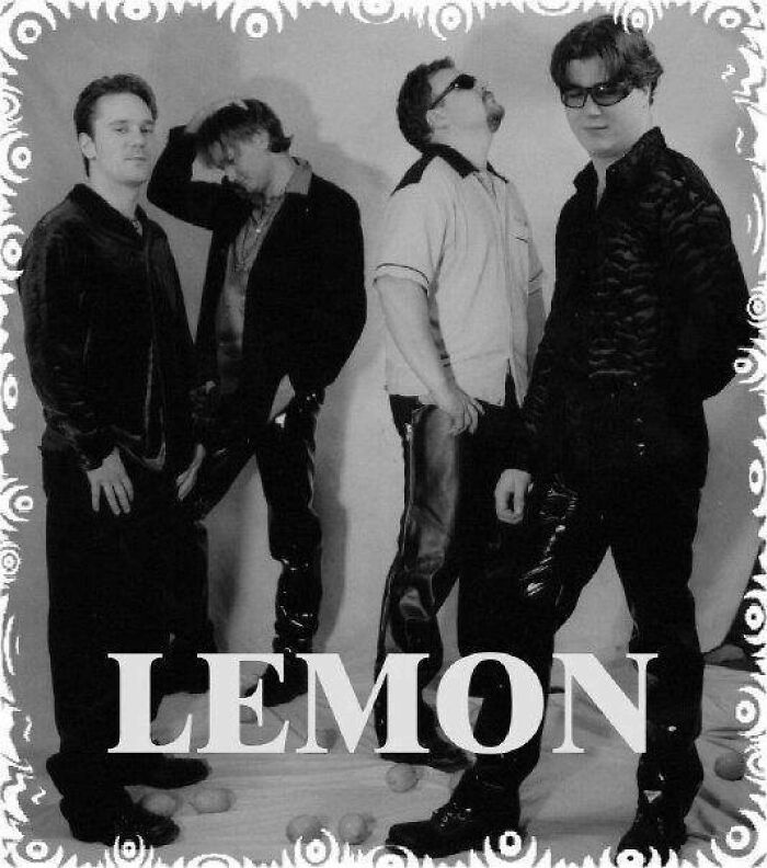 Here We Have A Display Of Some Of The Classic Band Photo Poses: From Left To Right We've Got The "Thumb In Pocket Prick" Then The "I Don't Want To Be Here/Did I Leave The Oven On" Then We Have The "If I Look At The Camera It Will Steal My Soul" And The Ever Popular "I'm The Singer So All I Need To Do Is Dress Like A Bit Of A C*nt And Put On The Douchiest Sunglasses I Own, Just So I Stand Out From The Rest Of These D*ckheads"