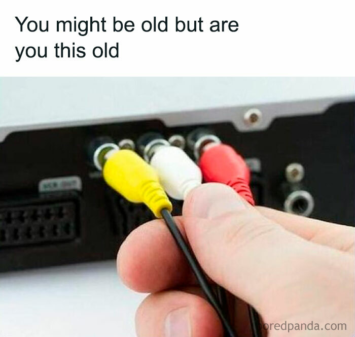 Gen X life meme with a hand connecting red, white, yellow AV cables into a device.