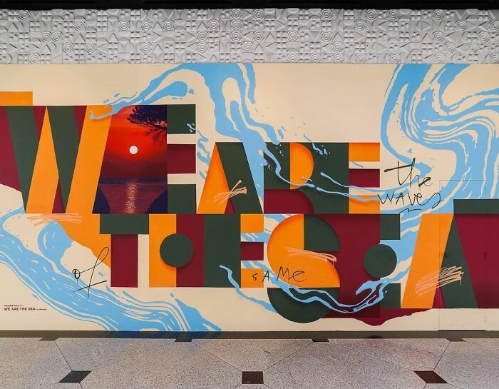Colorful creative graffiti art on a wall with abstract shapes and ocean-themed designs transforming the blank surface into an admired mural.