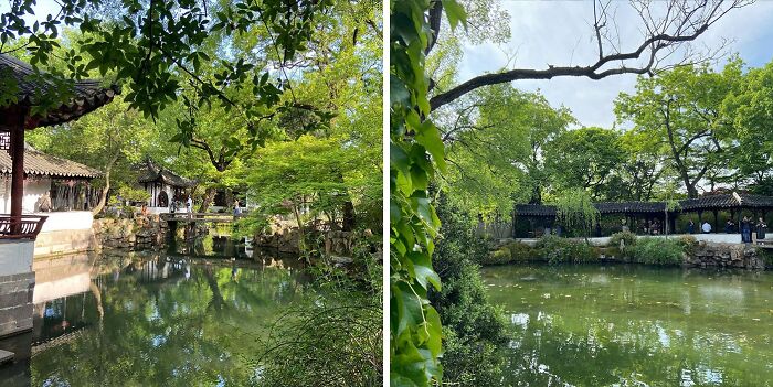 Tranquil famous garden with traditional architecture and lush greenery reflected in calm water under a clear sky.