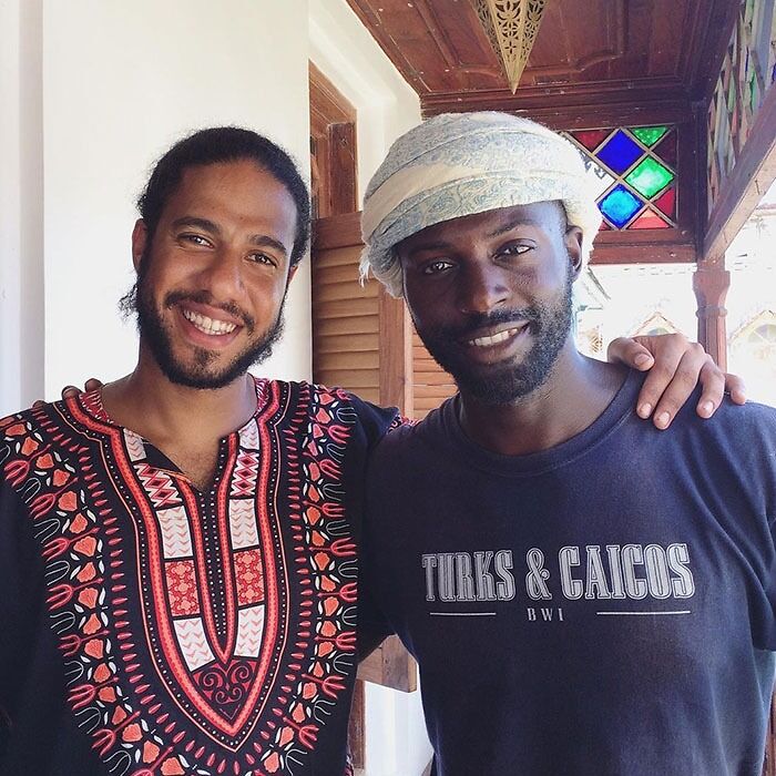 colorful Mario Rigby with friend smiling portrait