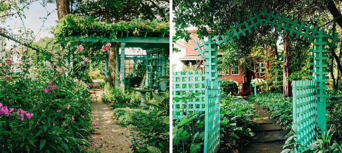 Lush greenery and colorful flowers along pathways in a famous garden with wooden trellises and arches.