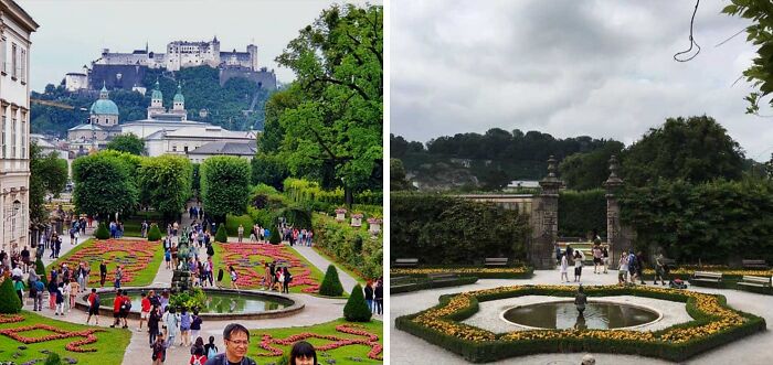 Famous gardens with colorful flower beds, visitors walking along pathways, and historic architecture in the background.