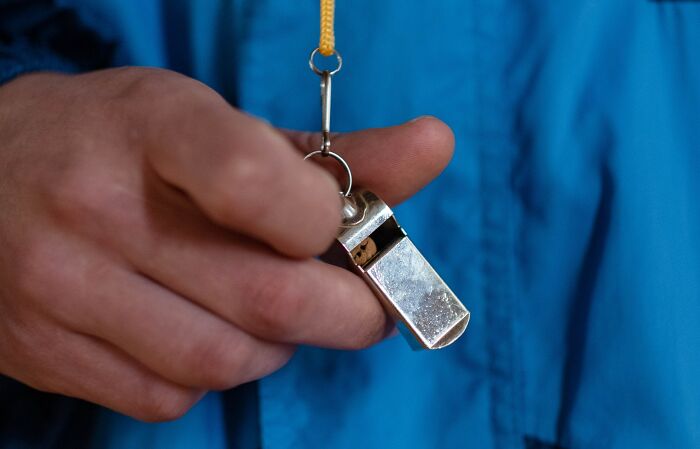 Man Holding A Whistle 