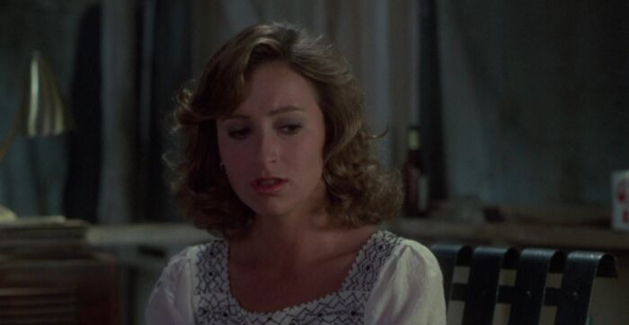 Baby wearing white shirt with print on the neck 