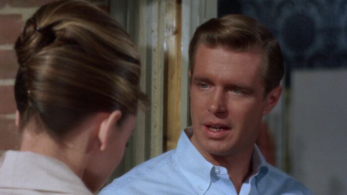 Paul wearing blue shirt 