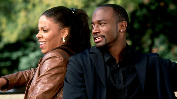 Sidney and Andrea sitting back to back 