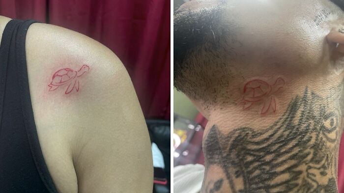 Minimalist red ink turtle tattoo on shoulder and neck against a red curtain background.