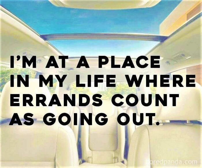 Text humorously says "errands count as going out" inside a car's interior, reflecting a funny post about aging.