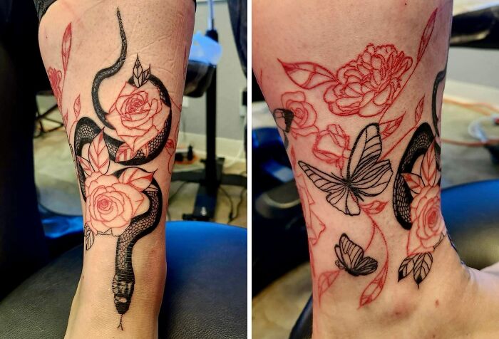 Red ink tattoo design with a black snake, roses, and butterflies on a person's leg.