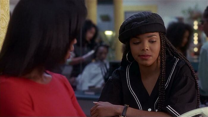 Justice wearing black shirt and hat 