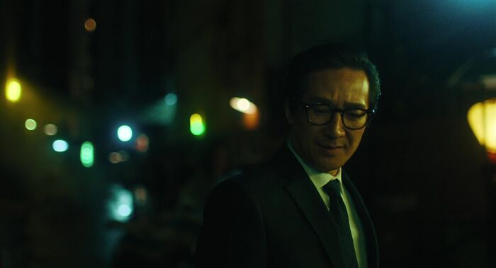 Waymond wearing black suite 