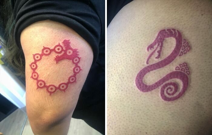 Red ink tattoo designs on arms featuring a circular pattern and a serpent.