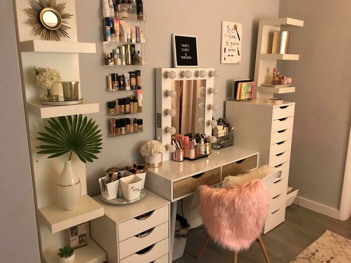 Creative inspiration with a makeup vanity setup, organized shelves, and decor in a stylish room.