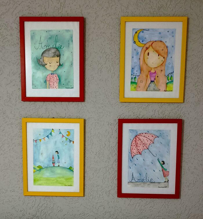 Four colorful framed illustrations on a textured wall for home decoration ideas.