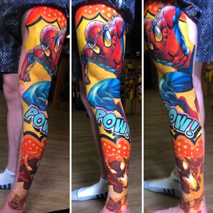 Colorful Marvel tattoo featuring a dynamic superhero Spider Man scene on a person's leg.