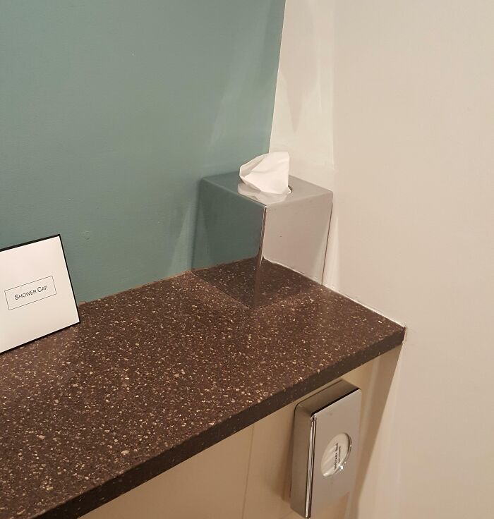 Reflective tissue box in a corner 