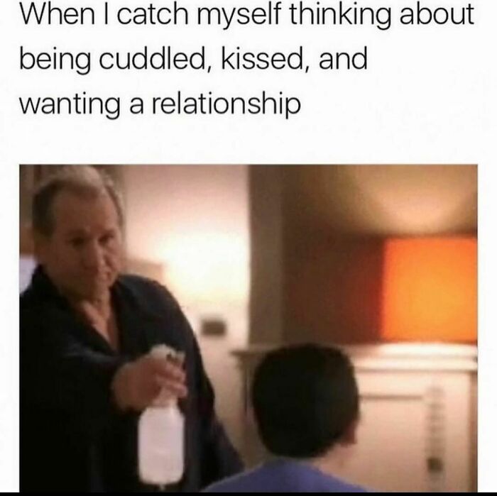 A humorous spicy meme about relationships featuring a person using a spray bottle as a reaction.