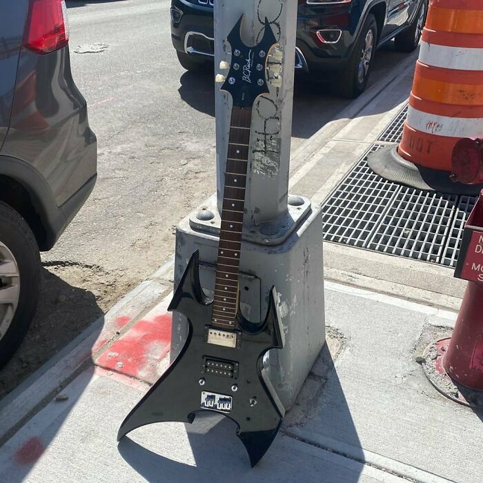 Rumor Has It That This Is A Very Expensive Guitar. Outside Of The Cubesmart On Bogart And Harrison Place 