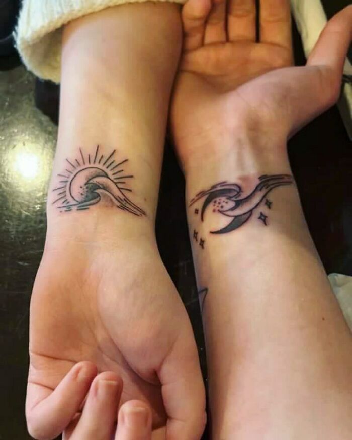 Two wrist tattoos featuring a stylized bird design, showcasing creative accessory options.