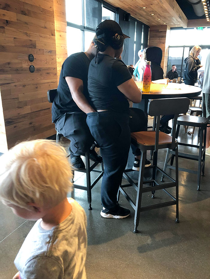 In A Kentucky Starbucks At Noon. Small Children All-Around