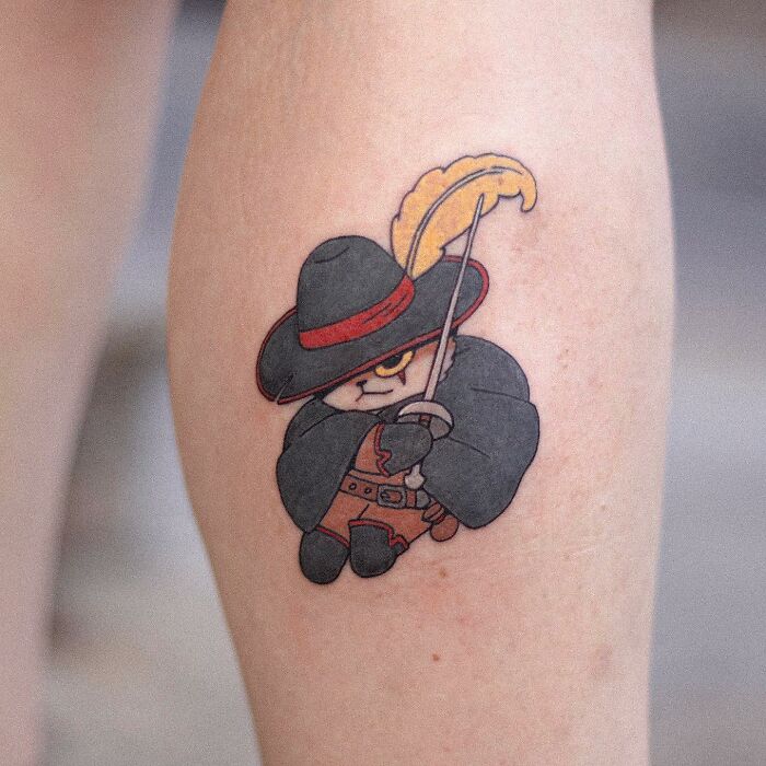Adorable animal-themed tattoo design of a cute swashbuckling character with a feathered hat and sword.