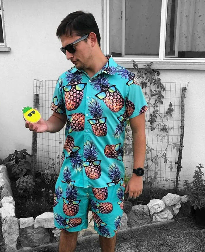 Man wearing costume with fruit prints