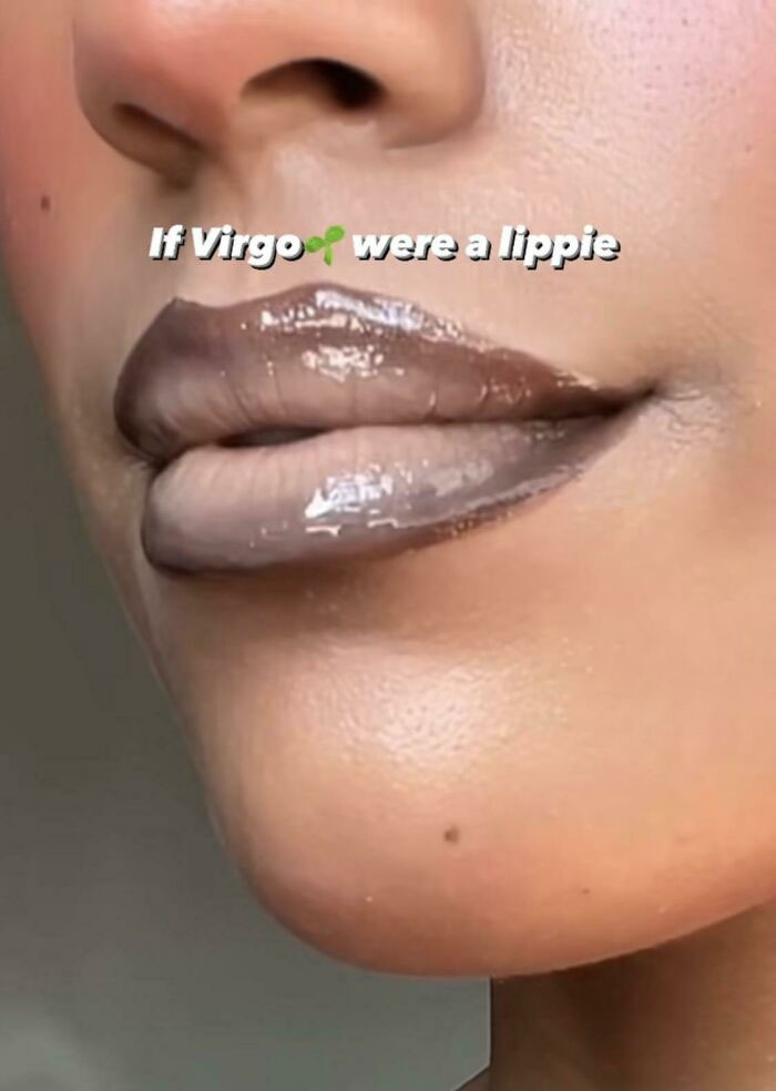 Close-up of lips with gray lipstick, showcasing a makeup fail. Text overlay reads "If Virgo were a lippie."