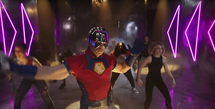 Group dance on led lit stage from Peacemaker