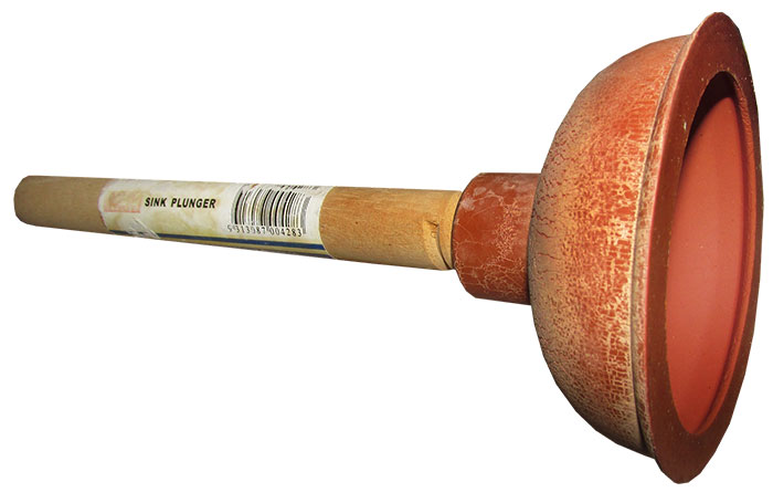 Toilet plunger in white background