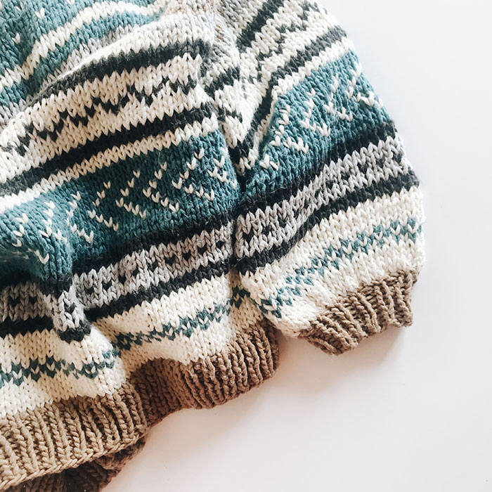 White blue and gray knit sweater