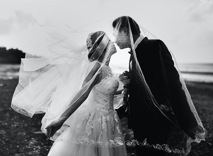 Bride and groom kissing