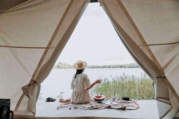 Person resting at the lake