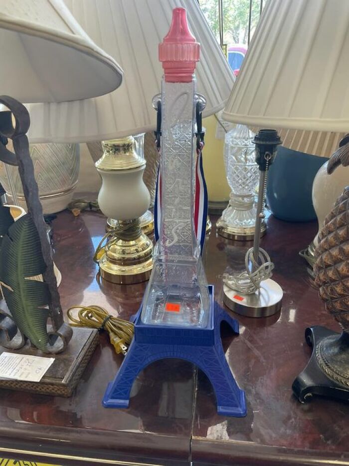 Not Entirely Sure…but I Think It’s A Plastic Eiffel Tower You Hang Around Your Neck And Drink Alcohol From. Salvation Army, St Petersburg, Fl