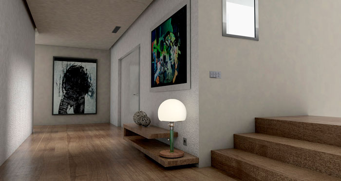 Modern home decoration with artwork, wooden stairs, and a stylish lamp in a hallway.