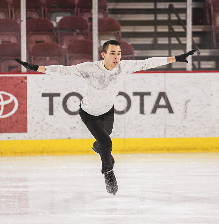 Man performing at skating competition