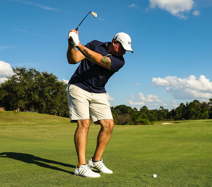 Man playing golf