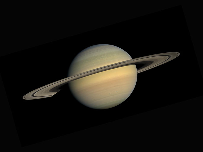 Saturn in space showcasing planetary rings, illustrating fascinating physics concepts and natural phenomena in the universe.